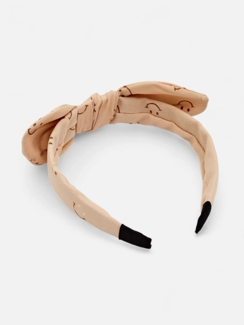 Royalfashion Дитяча пов'язка на волосся з бантиком з принтом у вигляді усміхнених облич