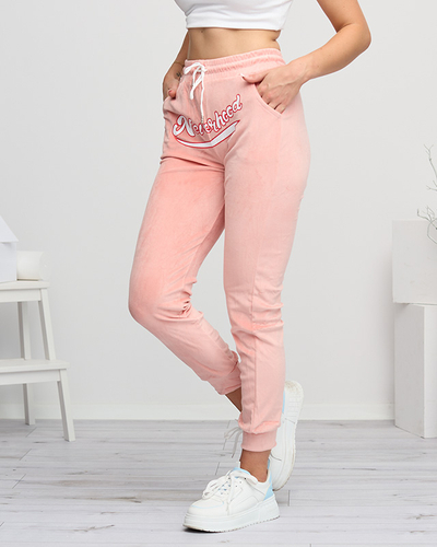 Damen-Jogginghose aus rosa Velours mit der Aufschrift - Kleidung