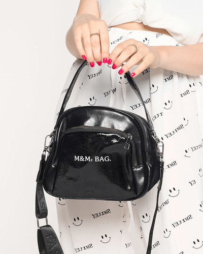 Kleine schwarze Damenhandtasche mit weißer Aufschrift - Accessoires