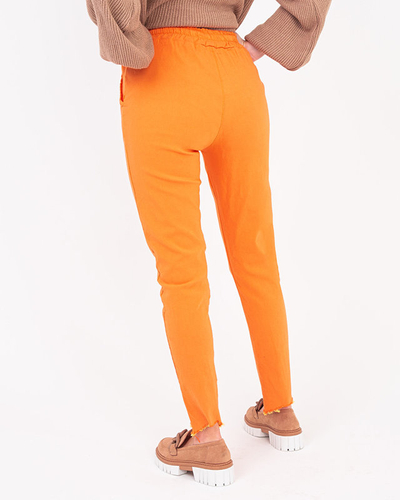 Damenhose aus orangefarbenem Stoff mit Zirkonia - Kleidung