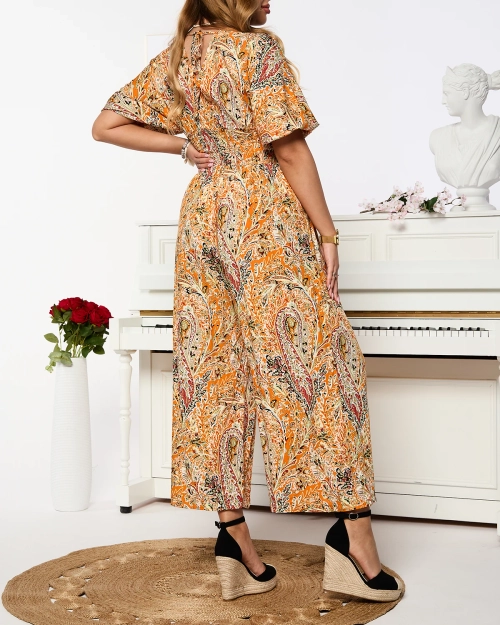 Жіночий візерунчастий комбінезон помаранчевого кольору - Одяг