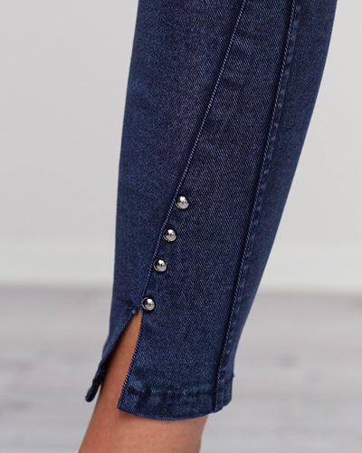 Темно-сині жіночі штани з вирізами і стразами