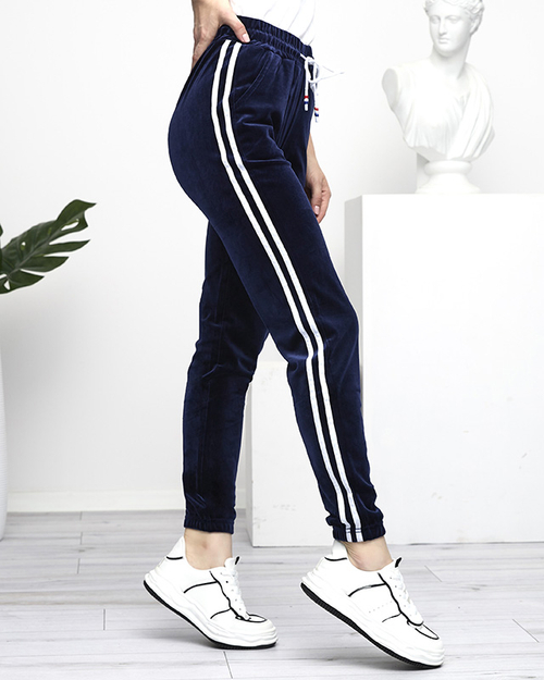 Темно-сині велюрові спортивні штани з лампасами