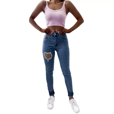 Blaue Damenjeans mit Zirkonen- Kleidung
