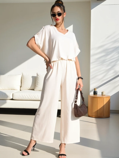 Royalfashion Damen Freizeitanzug mit einer kurzärmligen Bluse und weit geschnittenen Hosen