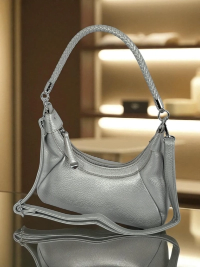 Royalfashion Kleine Damenhandtasche aus Öko-Leder mit dekorativem Riemen Lacquea