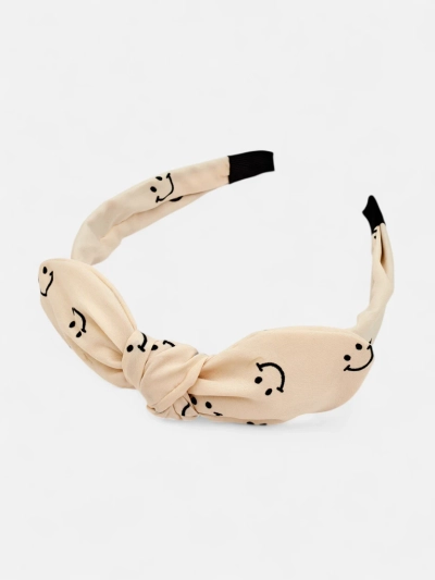 Royalfashion Kinderhaarband mit Schleife und Print aus lächelnden Gesichtern
