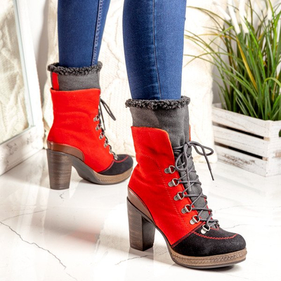 Red-black boots on the post with sheepskin coat - Footwear