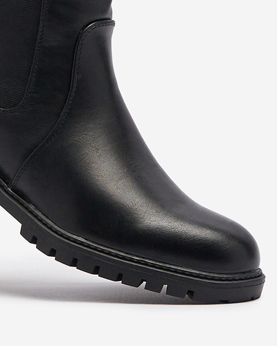 Жіночі чоботи до коліна на плоскому каблуці чорного кольору Dexis - Взуття