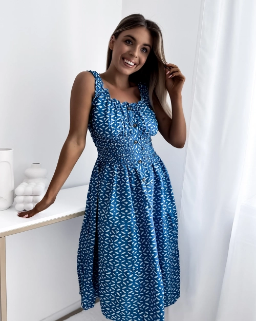 Жіноча сукня до коліна з принтом синього кольору - Одяг