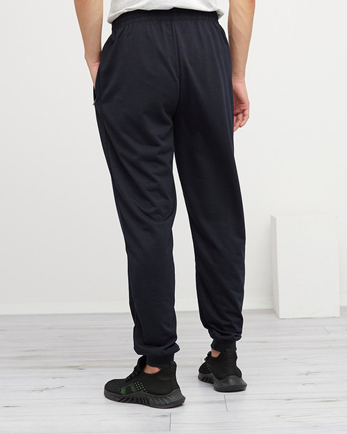 Чоловічі спортивні штани з темно-синьою нашивкою - Одяг