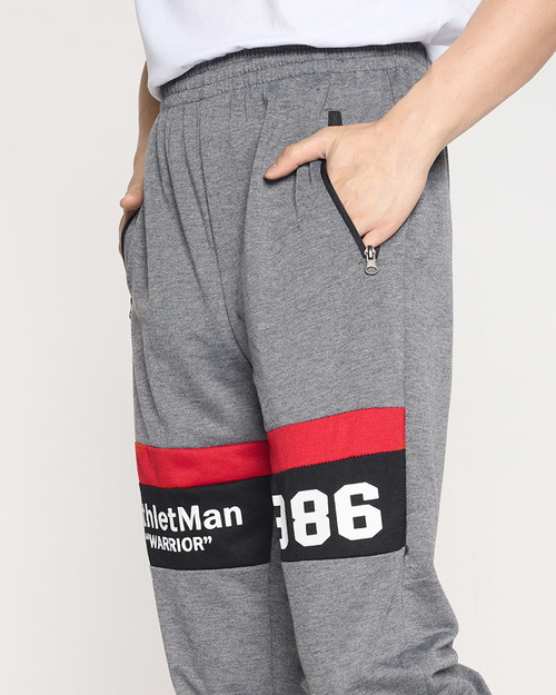 Чоловічі сірі спортивні штани з написами - Одяг