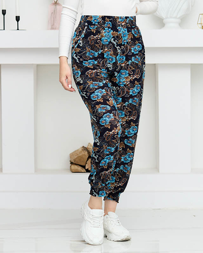 Marineblaue und türkise Damenhose mit Blumen PLUS SIZE - Kleidung