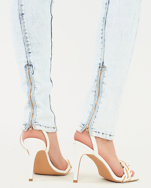 Блакитні жіночі джинси з блискавками