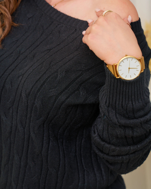 Royalfashion Чорний жіночий светр у клітинку