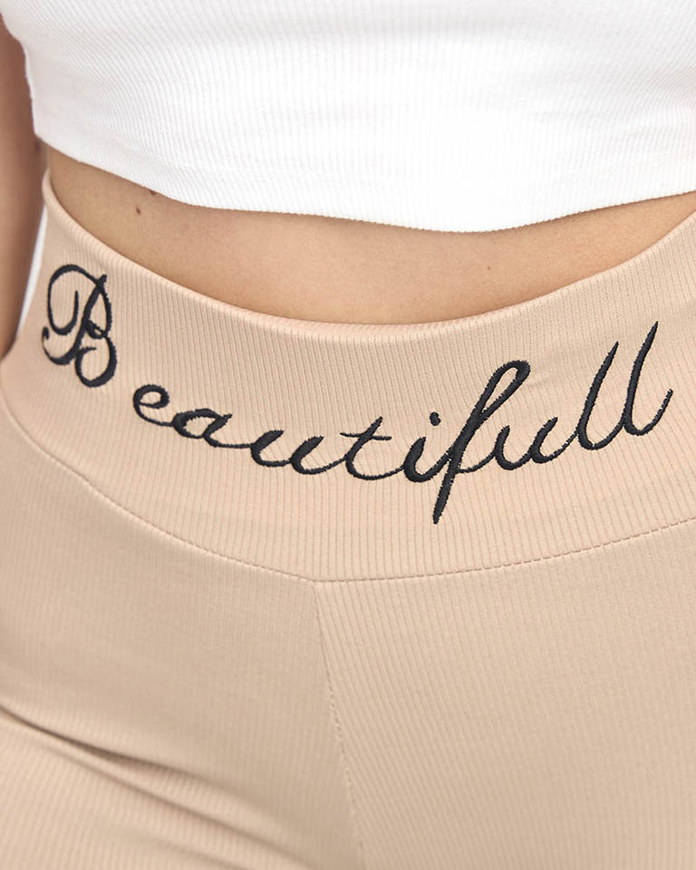 Hellbraune gerippte Damenleggings mit gestickter Aufschrift - Kleidung