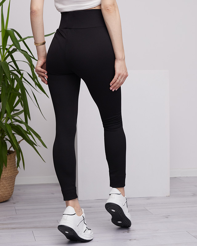 Schwarze, gerippte Damen-Leggings mit gesticktem Text - Kleidung