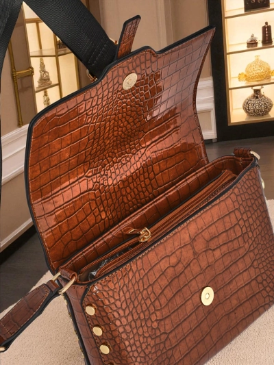 Royalfashion Lackierte kleine Damenhandtasche aus Kunstleder Velia Crest