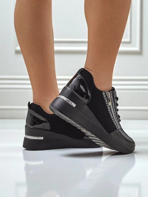 Чорні жіночі снікерси на танкетці Calista Nero - елегантність та зручність на кожен день