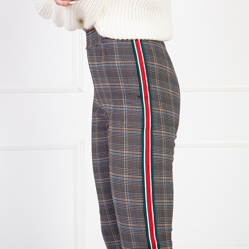 Жіночі утеплені легінси в клітинку