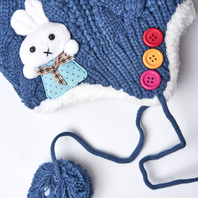 Темно-синя зимова шапка з помпонами