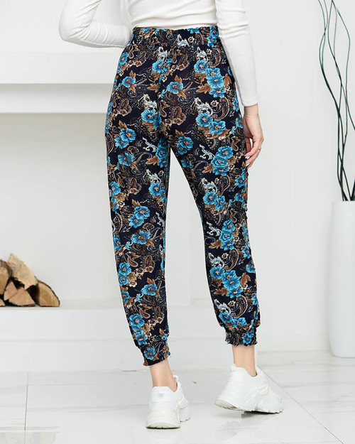 Темно-сині та бірюзові жіночі штани з квітами PLUS SIZE - Одяг
