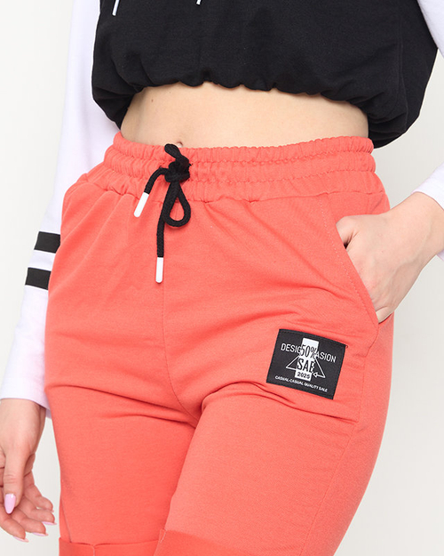 Жіночі шорти вище коліна в кораловому кольорі