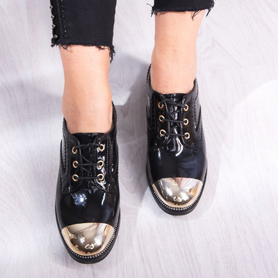 Schwarze Schuhe mit goldenem Zehenanzug - Schuhwerk