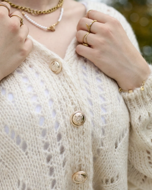 Royalfashion Кремовий короткий розстібний светр із золотими ґудзиками