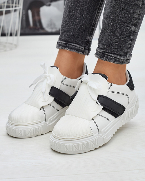 Чорно-білі жіночі спортивні кросівки з гумовими вставками Inika - Взуття