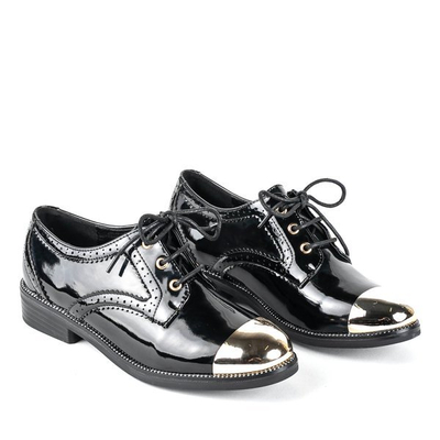 Schwarze Schuhe mit goldenem Zehenanzug - Schuhwerk