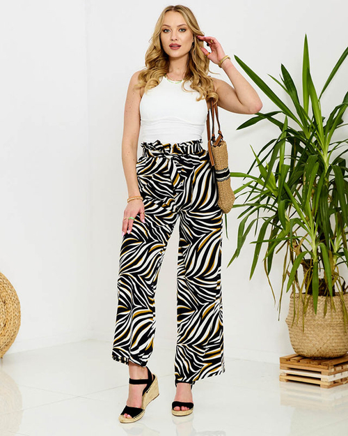 Візерункові жіночі брюки палаццо чорного кольору - Одяг