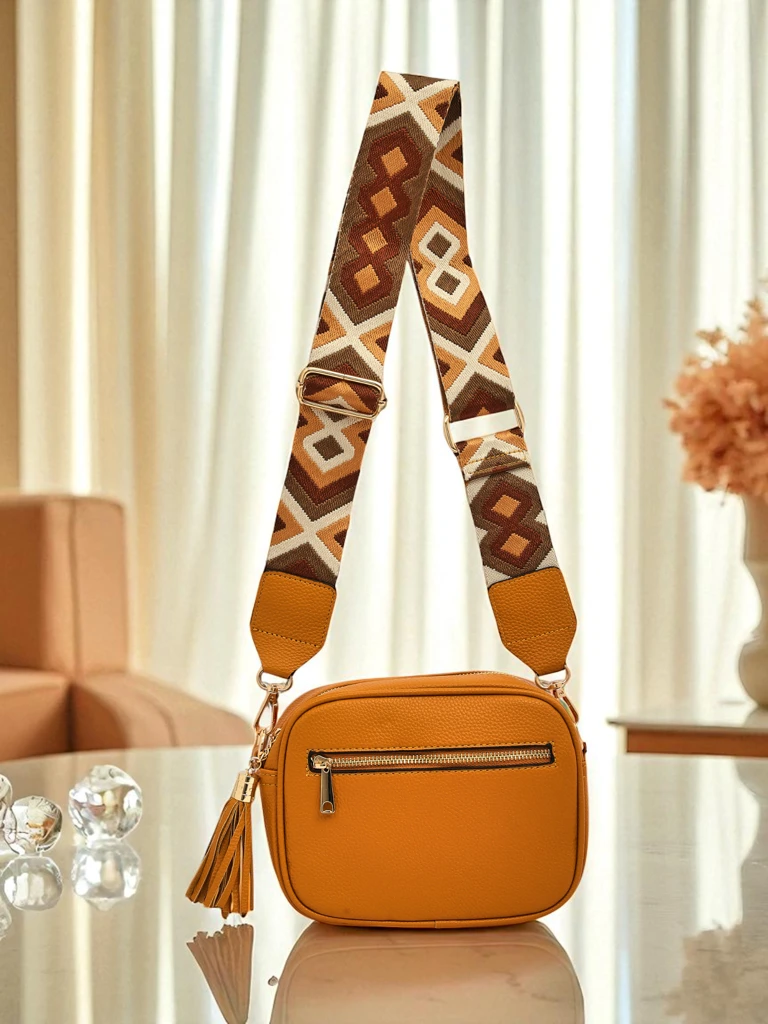 Royalfashion Kleine Damenhandtasche aus Öko-Leder mit buntem Riemen Kovi Lace