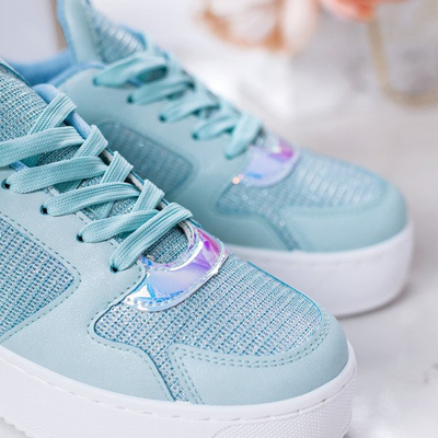 Blaue Sportschuhe auf der Salsa-Plattform - Schuhe 1