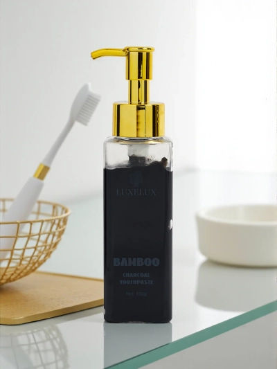 LUXELUX Відбілююча зубна паста з таурином і активованим вугіллям