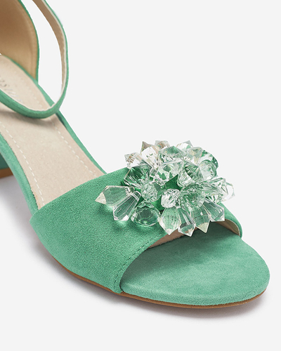 Grüne Damensandalen auf einem Pfosten mit dekorativen Kristallen Cerosso- Footwear