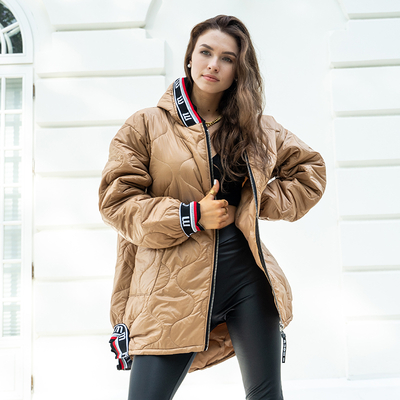 Коричнева жіноча стьобана куртка з капюшоном oversize