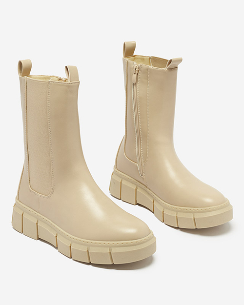 Бежеві жіночі чоботи на платформі Couell - Взуття