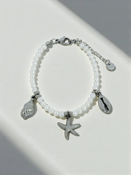 Armband Poseidon Mare Stella mit maritimen Motiven und Perlen