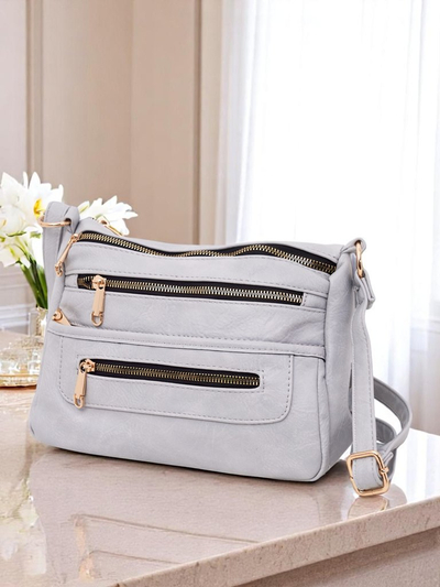 Royalfashion Kleine quadratische Handtasche aus Ökoleder Niva Time