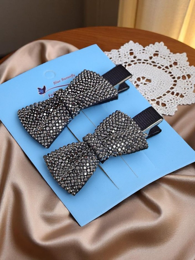 Royalfashion Set aus 2 Haarklammern mit Schleifen und Strasssteinen Isadora