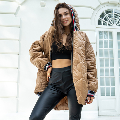 Коричнева жіноча стьобана куртка з капюшоном oversize