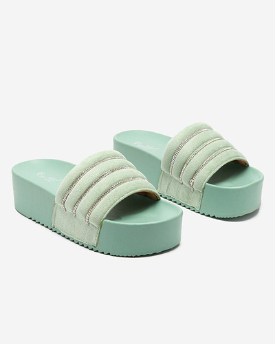 Grüne Damenhausschuhe auf der Plattform Sunavi. Schuhe