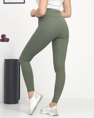Grüne, gerippte Damen-Leggings mit orangefarbenen Zeichen - Kleidung