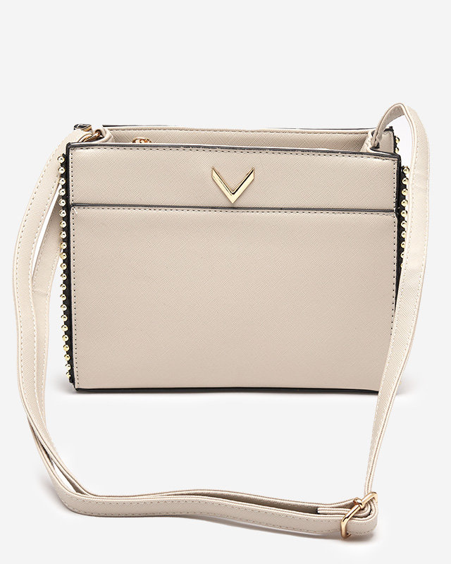 Klassische beige Handtasche mit Dekoration - Accessoires