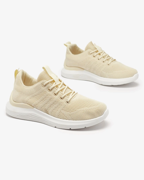 Кремові жіночі тканинні спортивні кросівки Bofia - Взуття