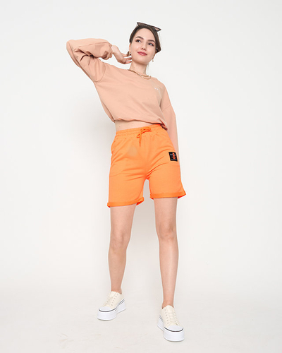 Neonorange Damen-Shorts oberhalb des Knies - Kleidung