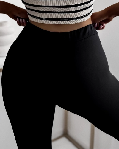 Schwarze Damen-Leggings mit herzförmigen Ausschnitten und Zirkonen- Bekleidung