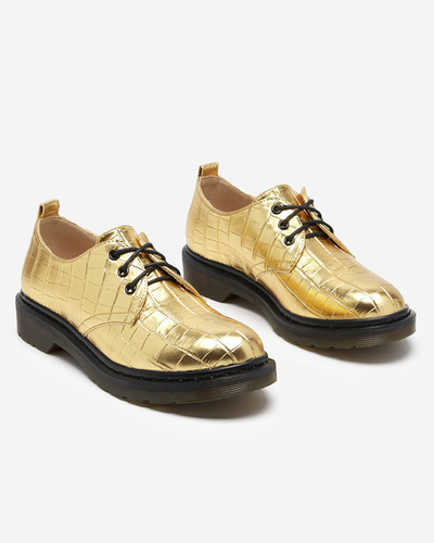 Goldener Damenschuh mit Seniri-Prägung - Schuhe