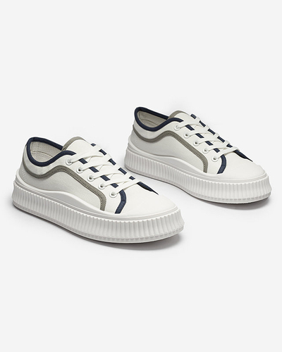 Жіночі кросівки на суцільній підошві білого кольору Dessica - Взуття